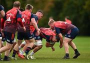 31 October 2023; Jack O'Sullivan is tackld by John Ryan during Munster rugby squad training at the University of Limerick in Limerick. Photo by Brendan Moran/Sportsfile