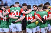 29 October 2023; Ballina Stephenites goalkeeper David Clarke, left, alongside Padraig O'Hora with team-mates in a huddel before the Mayo County Senior Club Football Championship final match between Ballina Stephenites and Breaffy at Hastings Insurance MacHale Park in Castlebar, Mayo. Photo by Piaras Ó Mídheach/Sportsfile