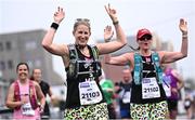 29 October 2023; Valerie Holmes, left, and Joanna Robinson during the 2023 Irish Life Dublin Marathon. Thousands of runners took to the Fitzwilliam Square start line, to participate in the 42nd running of the Dublin Marathon. Photo by Ramsey Cardy/Sportsfile