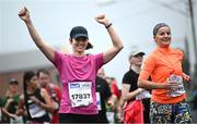 29 October 2023; Niamh Delaney from Dublin, left, and Caroline O'Neill from Kildare during the 2023 Irish Life Dublin Marathon. Thousands of runners took to the Fitzwilliam Square start line, to participate in the 42nd running of the Dublin Marathon. Photo by Ramsey Cardy/Sportsfile