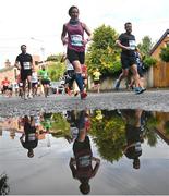 29 October 2023; Nora Butler from Wicklow during the 2023 Irish Life Dublin Marathon. Thousands of runners took to the Fitzwilliam Square start line, to participate in the 42nd running of the Dublin Marathon. Photo by Ramsey Cardy/Sportsfile