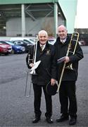 29 October 2023; Tommy O'Malley, left, and Tom Kelly of the Castlebar Concert Band make their way ground before the Mayo County Senior Club Football Championship final match between Ballina Stephenites and Breaffy at Hastings Insurance MacHale Park in Castlebar, Mayo. Photo by Piaras Ó Mídheach/Sportsfile