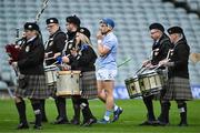 28 October 2023; Na Piarsaigh captain Mike Casey leads his team-mates in the parade behind the Newcastle West & District Pipe Band before the Limerick County Senior Club Hurling Championship final between Na Piarsaigh and Patrickswell at the TUS Gaelic Grounds in Limerick. Photo by Piaras Ó Mídheach/Sportsfile