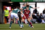 31 October 2023; Dóra Zeller of Hungary in action against Sarah McFadden, left, and Chloe McCarron of Northern Ireland during the UEFA Women's Nations League B match between Northern Ireland and Hungary at Seaview in Belfast. Photo by Ramsey Cardy/Sportsfile
