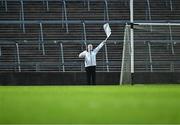 28 October 2023; An umpire waves a white flag for a point during the Limerick County Senior Club Hurling Championship final between Na Piarsaigh and Patrickswell at the TUS Gaelic Grounds in Limerick. Photo by Piaras Ó Mídheach/Sportsfile