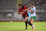31 October 2023; Kristina Maksuti of Albania in action against Jamie Finn of Republic of Ireland during the UEFA Women's Nations League B match between Albania and Republic of Ireland at Loro Boriçi Stadium in Shkoder, Albania. Photo by Stephen McCarthy/Sportsfile