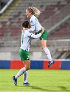 31 October 2023; Denise O'Sullivan of Republic of Ireland, right, celebrates with teammate Katie McCabe after scoring their side's first goal during the UEFA Women's Nations League B match between Albania and Republic of Ireland at Loro Boriçi Stadium in Shkoder, Albania. Photo by Stephen McCarthy/Sportsfile