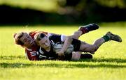 1 November 2023; Muireann Cawley of North Midlands in action against Anna Dawson of North East during the BearingPoint Sarah Robinson Cup round two match between North East and North Midlands at Mullingar RFC in Mullingar, Westmeath. Photo by Piaras Ó Mídheach/Sportsfile