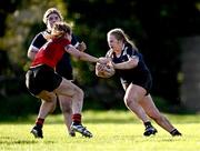1 November 2023; Avril Whittle of North Midlands in action against Anna Dawson of North East during the BearingPoint Sarah Robinson Cup round two match between North East and North Midlands at Mullingar RFC in Mullingar, Westmeath. Photo by Piaras Ó Mídheach/Sportsfile