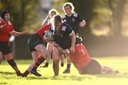 1 November 2023; Isobel Furlong of North Midlands in action against Chloe Ericson and Lauren Bryce of North East, 1, during the BearingPoint Sarah Robinson Cup round two match between North East and North Midlands at Mullingar RFC in Mullingar, Westmeath. Photo by Piaras Ó Mídheach/Sportsfile