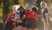 1 November 2023; Isobel Furlong of North Midlands is tackled by Lauren Bryce of North East, 1, during the BearingPoint Sarah Robinson Cup round two match between North East and North Midlands at Mullingar RFC in Mullingar, Westmeath. Photo by Piaras Ó Mídheach/Sportsfile