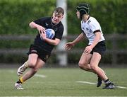 1 November 2023; Alex Bulmer of Metro in action against Aidan Kelly of Midlands during the BearingPoint Shane Horgan Cup round two match between Metro and Midlands at Mullingar RFC in Mullingar, Westmeath. Photo by Piaras Ó Mídheach/Sportsfile