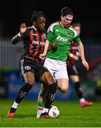 3 November 2023; Jonathan Afolabi of Bohemians is tackled by Sam Bailey of Cork City during the SSE Airtricity Men's Premier Division match between Bohemians and Cork City at Dalymount Park in Dublin. Photo by Tyler Miller/Sportsfile