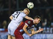 3 November 2023; Evan Caffrey of Shelbourne in action against Kyle Robinson of Drogheda United during the SSE Airtricity Men's Premier Division match between Drogheda United and Shelbourne at Weaver's Park in Drogheda, Louth. Photo by Piaras Ó Mídheach/Sportsfile