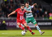 3 November 2023; Greg Bolger of Sligo Rovers in action against Graham Burke of Shamrock Rovers during the SSE Airtricity Men's Premier Division match between Shamrock Rovers and Sligo Rovers at Tallaght Stadium in Dublin. Photo by Seb Daly/Sportsfile