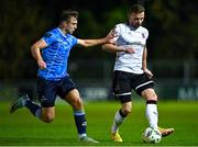 3 November 2023; Andy Boyle of Dundalk in action against Adam Wells of UCD during the SSE Airtricity Men's Premier Division match between UCD and Dundalk at UCD Bowl in Dublin. Photo by Stephen Marken/Sportsfile