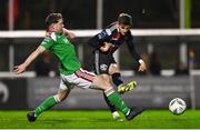 3 November 2023; Paddy Kirk of Bohemians is tackled by Cian Murphy of Cork City during the SSE Airtricity Men's Premier Division match between Bohemians and Cork City at Dalymount Park in Dublin. Photo by Tyler Miller/Sportsfile