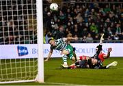 3 November 2023; Aaron Greene of Shamrock Rovers shoots to score his side's third goal past Sligo Rovers goalkeeper Conor Walsh during the SSE Airtricity Men's Premier Division match between Shamrock Rovers and Sligo Rovers at Tallaght Stadium in Dublin. Photo by Stephen McCarthy/Sportsfile
