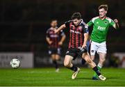 3 November 2023; James Clarke of Bohemians in action against Oran Crowe of Cork City during the SSE Airtricity Men's Premier Division match between Bohemians and Cork City at Dalymount Park in Dublin. Photo by Tyler Miller/Sportsfile