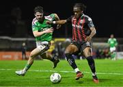 3 November 2023; Jonathan Afolabi of Bohemians in action against Sam Bailey of Cork City during the SSE Airtricity Men's Premier Division match between Bohemians and Cork City at Dalymount Park in Dublin. Photo by Tyler Miller/Sportsfile