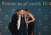 3 November 2023; MC Marty Morrissey with TG4 Intermediate Team of the Championship award winners Chloe Moloney, left, and Fidelma Marrinan, both of Clare during the 2023 TG4 Teams of the Championship awards night at Croke Park in Dublin. Photo by Sam Barnes/Sportsfile