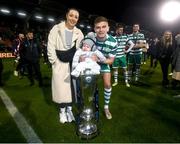 3 November 2023; Sean Gannon of Shamrock Rovers with his wife Kate and son Alfie, aged 5 months, celebrate with the SSE Airtricity League Premier Division trophy after the SSE Airtricity Men's Premier Division match between Shamrock Rovers and Sligo Rovers at Tallaght Stadium in Dublin. Photo by Stephen McCarthy/Sportsfile