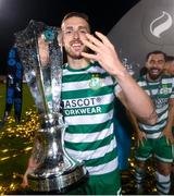 3 November 2023; Lee Grace of Shamrock Rovers celebrates with the SSE Airtricity League Premier Division trophy after the SSE Airtricity Men's Premier Division match between Shamrock Rovers and Sligo Rovers at Tallaght Stadium in Dublin. Photo by Stephen McCarthy/Sportsfile