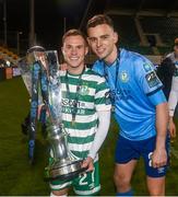 3 November 2023; Liam Burt, left, and Leon Pohls of Shamrock Rovers celebrate with the SSE Airtricity Men's Premier Division trophy after the SSE Airtricity Men's Premier Division match between Shamrock Rovers and Sligo Rovers at Tallaght Stadium in Dublin. Photo by Stephen McCarthy/Sportsfile