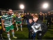 3 November 2023; Jayden, right, and Josh Bradley, sons of Shamrock Rovers manager Stephen Bradley, celebrate with the SSE Airtricity Men's Premier Division trophy after the SSE Airtricity Men's Premier Division match between Shamrock Rovers and Sligo Rovers at Tallaght Stadium in Dublin. Photo by Stephen McCarthy/Sportsfile