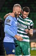 3 November 2023; Shamrock Rovers goalkeeper Alan Mannus, left, is presented with his medal by teammate Ronan Finn after the SSE Airtricity Men's Premier Division match between Shamrock Rovers and Sligo Rovers at Tallaght Stadium in Dublin. Photo by Seb Daly/Sportsfile