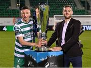 3 November 2023; Shamrock Rovers captain Ronan Finn is presented with the SSE Airtricity Men's Premier Division trophy by SSE Airtricity digital media lead Gar Murphy after the SSE Airtricity Men's Premier Division match between Shamrock Rovers and Sligo Rovers at Tallaght Stadium in Dublin. Photo by Seb Daly/Sportsfile *** NO REPRODUCTION FEE ***