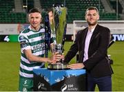 3 November 2023; Shamrock Rovers captain Ronan Finn is presented with the SSE Airtricity Men's Premier Division trophy by SSE Airtricity digital media lead Gar Murphy after the SSE Airtricity Men's Premier Division match between Shamrock Rovers and Sligo Rovers at Tallaght Stadium in Dublin. Photo by Seb Daly/Sportsfile