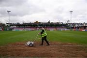 4 November 2023; Groundsman Sean Murphy prepares the pitch before the SSE Airtricity Men's First Division Play-Off Final between Waterford and Cobh Ramblers at Turner's Cross in Cork. Photo by Michael P Ryan/Sportsfile