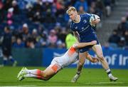 4 November 2023; Jamie Osborne of Leinster is tackled by Mark Bennett of Edinburgh during the United Rugby Championship match between Leinster and Edinburgh at the RDS Arena in Dublin. Photo by Sam Barnes/Sportsfile