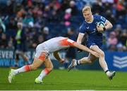 4 November 2023; Jamie Osborne of Leinster is tackled by Mark Bennett of Edinburgh during the United Rugby Championship match between Leinster and Edinburgh at the RDS Arena in Dublin. Photo by Sam Barnes/Sportsfile