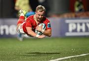 4 November 2023; Craig Casey of Munster on his way to scoring his side's fifth try during the United Rugby Championship match between Munster and Dragons at Musgrave Park in Cork. Photo by Piaras Ó Mídheach/Sportsfile