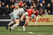 4 November 2023; Shane Daly of Munster in action against Ashton Hewitt of Dragons during the United Rugby Championship match between Munster and Dragons at Musgrave Park in Cork. Photo by Piaras Ó Mídheach/Sportsfile