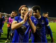 4 November 2023; Waterford players Ronan Coughlan, left, and Derik Osede after their side's victory in the SSE Airtricity Men's First Division Play-Off Final between Waterford and Cobh Ramblers at Turner's Cross in Cork. Photo by Michael P Ryan/Sportsfile
