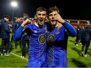 4 November 2023; Waterford players Dean McMenamy, left, and Ryan Burke after their side's victory in the SSE Airtricity Men's First Division Play-Off Final between Waterford and Cobh Ramblers at Turner's Cross in Cork. Photo by Michael P Ryan/Sportsfile