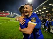 4 November 2023; Waterford players Ronan Coughlan, right, with Ryan Burke after their side's victory in the SSE Airtricity Men's First Division Play-Off Final between Waterford and Cobh Ramblers at Turner's Cross in Cork. Photo by Michael P Ryan/Sportsfile