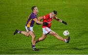 4 November 2023; Colm Hulton of Éire Óg in action against Shane Cunningham of Kilmacud Crokes during the AIB Leinster GAA Football Senior Club Championship quarter-final match between Éire Óg and Kilmacud Crokes at Netwatch Cullen Park in Carlow. Photo by Seb Daly/Sportsfile