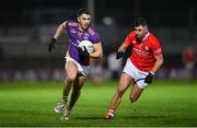 4 November 2023; Shane Walsh of Kilmacud Crokes in action against Colm Hulton of Éire Óg during the AIB Leinster GAA Football Senior Club Championship quarter-final match between Éire Óg and Kilmacud Crokes at Netwatch Cullen Park in Carlow. Photo by Seb Daly/Sportsfile