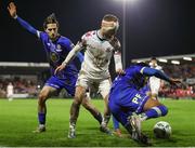 4 November 2023; Derik Osede of Waterford in action against Jack Doherty of Cobh Ramblers during the SSE Airtricity Men's First Division Play-Off Final between Waterford and Cobh Ramblers at Turner's Cross in Cork. Photo by Michael P Ryan/Sportsfile