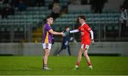 4 November 2023; Dan O’Brien of Kilmacud Crokes and Josh Brady of Éire Óg shake hands after the AIB Leinster GAA Football Senior Club Championship quarter-final match between Éire Óg and Kilmacud Crokes at Netwatch Cullen Park in Carlow. Photo by Seb Daly/Sportsfile