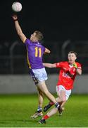 4 November 2023; Paul Mannion of Kilmacud Crokes intercepts a pass by Shane Buggy of Éire Óg during the AIB Leinster GAA Football Senior Club Championship quarter-final match between Éire Óg and Kilmacud Crokes at Netwatch Cullen Park in Carlow. Photo by Seb Daly/Sportsfile