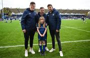 4 November 2023; Match day mascot Eve Curtin, aged eight, with Leinster players, from left, Dan Sheehan, Luke McGrath and Ross Byrne before the United Rugby Championship match between Leinster and Edinburgh at the RDS Arena in Dublin. Photo by Harry Murphy/Sportsfile