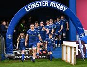 4 November 2023; Leinster captain Scott Penny walks out with matchday mascots Eve Curtin and Eve Curtin, both aged eight, before the United Rugby Championship match between Leinster and Edinburgh at the RDS Arena in Dublin. Photo by Harry Murphy/Sportsfile