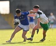 5 November 2023; Danny McCartan of St Loman's Mullingar in action against Niall Farrelly of Killoe Young Emmetts during the AIB Leinster GAA Football Senior Club Championship quarter-final match between Killoe Young Emmets and St Loman's Mullingar at Glennon Brothers Pearse Park in Longford. Photo by Stephen Marken/Sportsfile