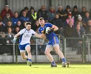 5 November 2023; Adam Flanagan of Summerhill in action against Cathal Daly of Naas during the AIB Leinster GAA Football Senior Club Championship quarter-final match between Naas and Summerhill at Manguard Park in Kildare. Photo by Piaras Ó Mídheach/Sportsfile