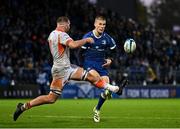 4 November 2023; Sam Prendergast of Leinster in action against Tom Dodd of Edinburgh during the United Rugby Championship match between Leinster and Edinburgh at the RDS Arena in Dublin. Photo by Sam Barnes/Sportsfile